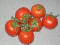 sechs rote Tomaten